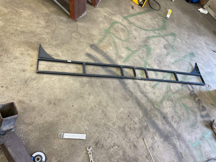 Steel rail frames with gussets